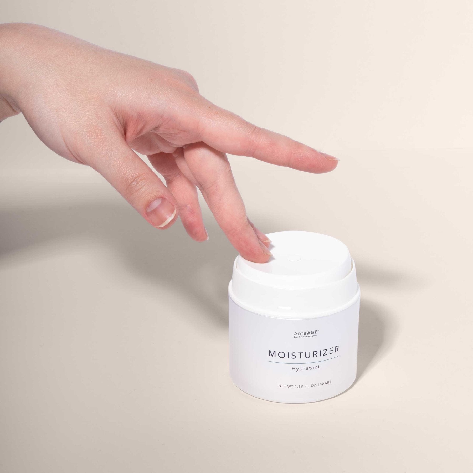 Applying AnteAGE Moisturizer